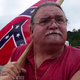 This unidentified man at a pro-Confederate flag rally was approached by George Chidi about the FUBU shoes he was wearing.
YouTube/George Chidi